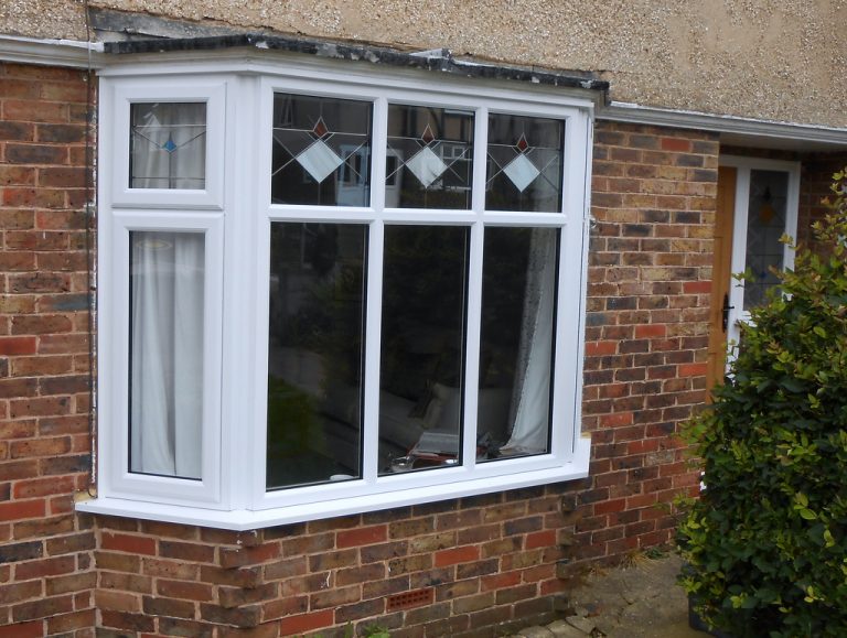 White Upvc Bay Window With Bespoke Coloured Leads - Countryman